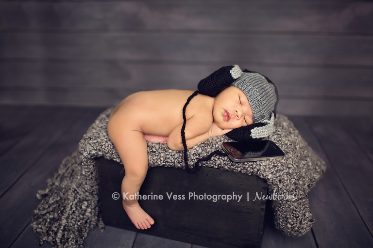 newborn with headphones