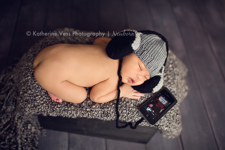 newborn baby with ipod