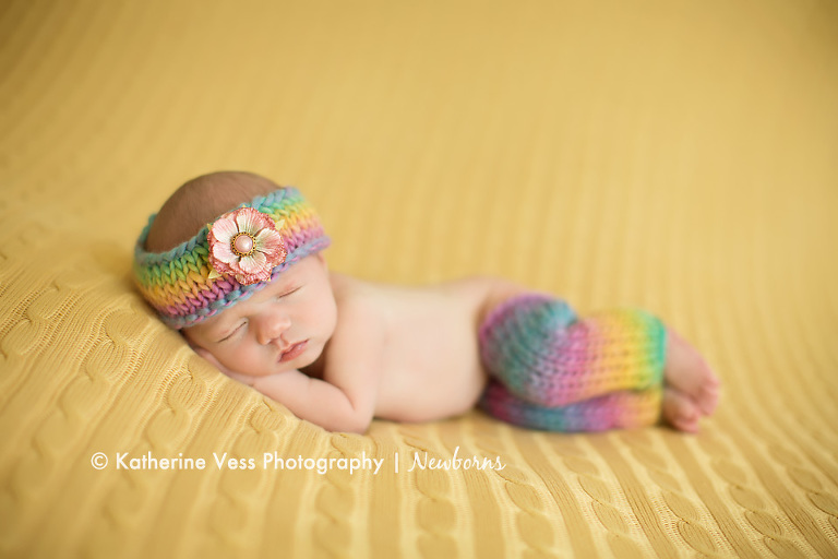 baby girl in headband and leggies