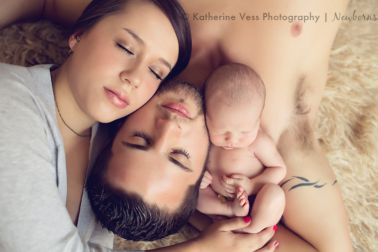 posing parents with newborns