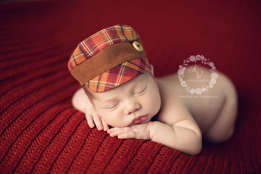 newborn on burnt orange