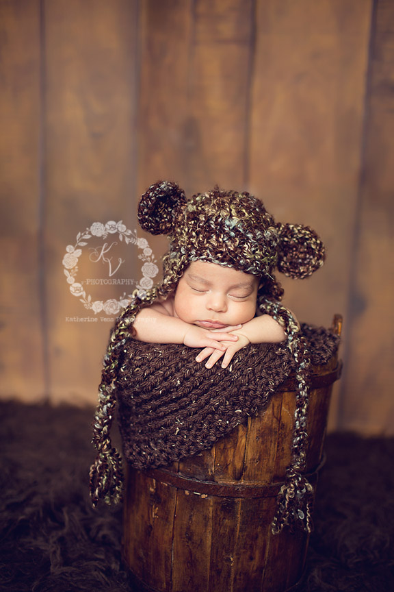newborn in bear hat