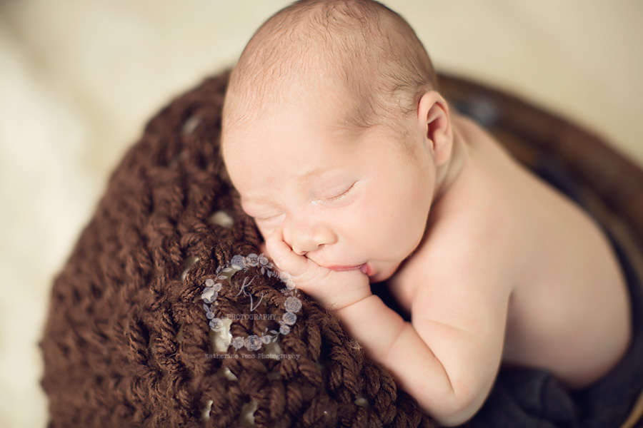 newborn sucking thumb