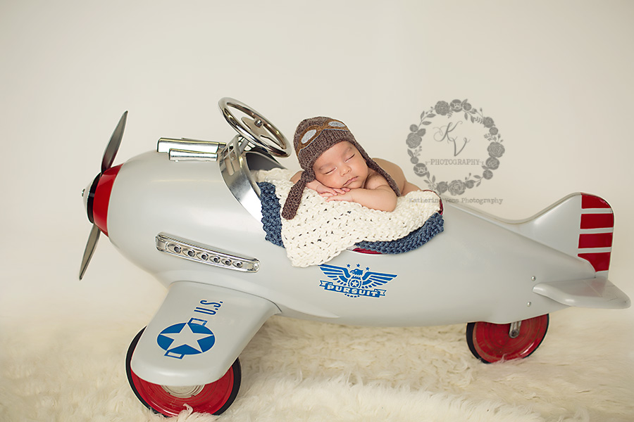 newborn in airplane