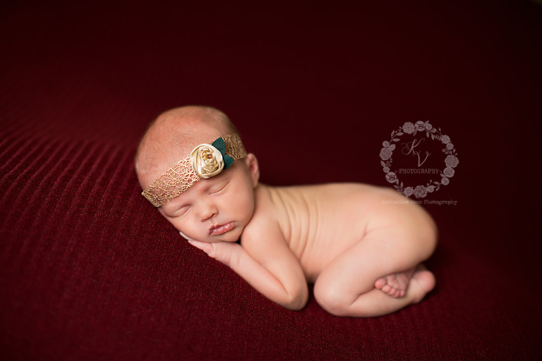 newborn tushie up pose