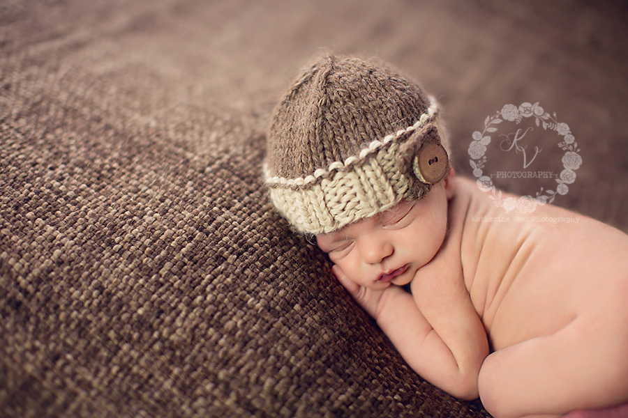 newborn in knit hat