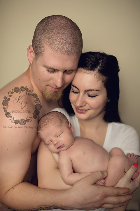 newborn with mom and dad