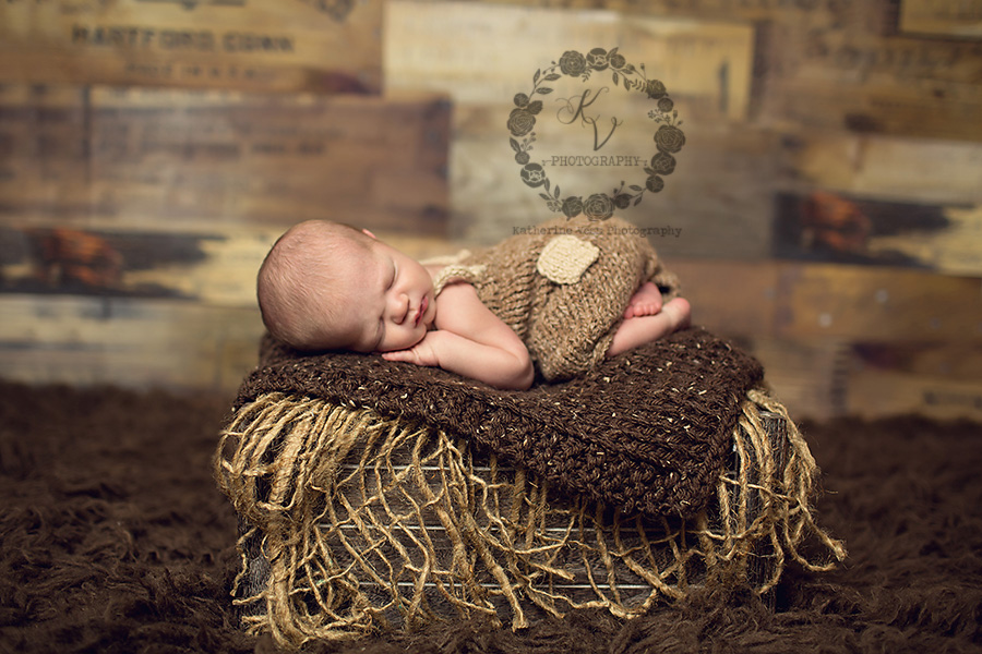 newborn on crate, brown neutral setup