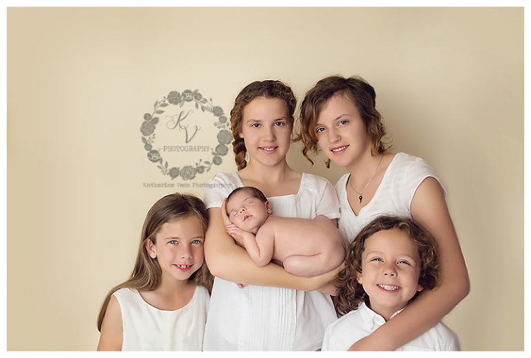 newborn with siblings