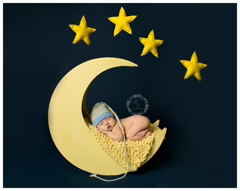 newborn on moon prop