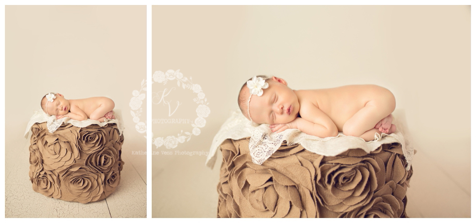 newborn on flower pouf